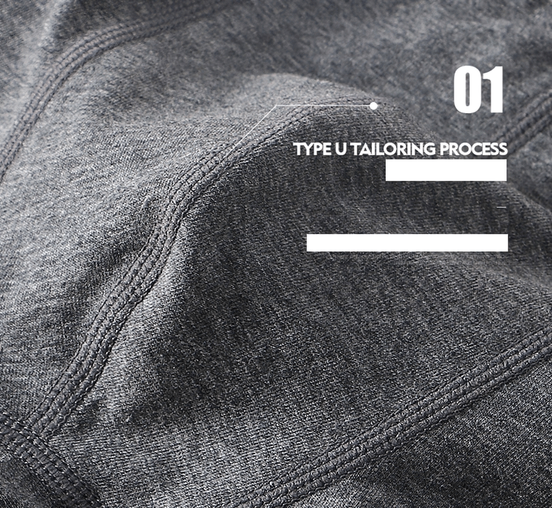 Close-up of gray cotton fabric emphasizing Type U tailoring for men's boxers, showcasing smooth seams and quality texture.